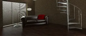 Cabecera de contacto-pavisuelos-con sofá chester negro en esquina de salón con suelo de madera oscura-elegante